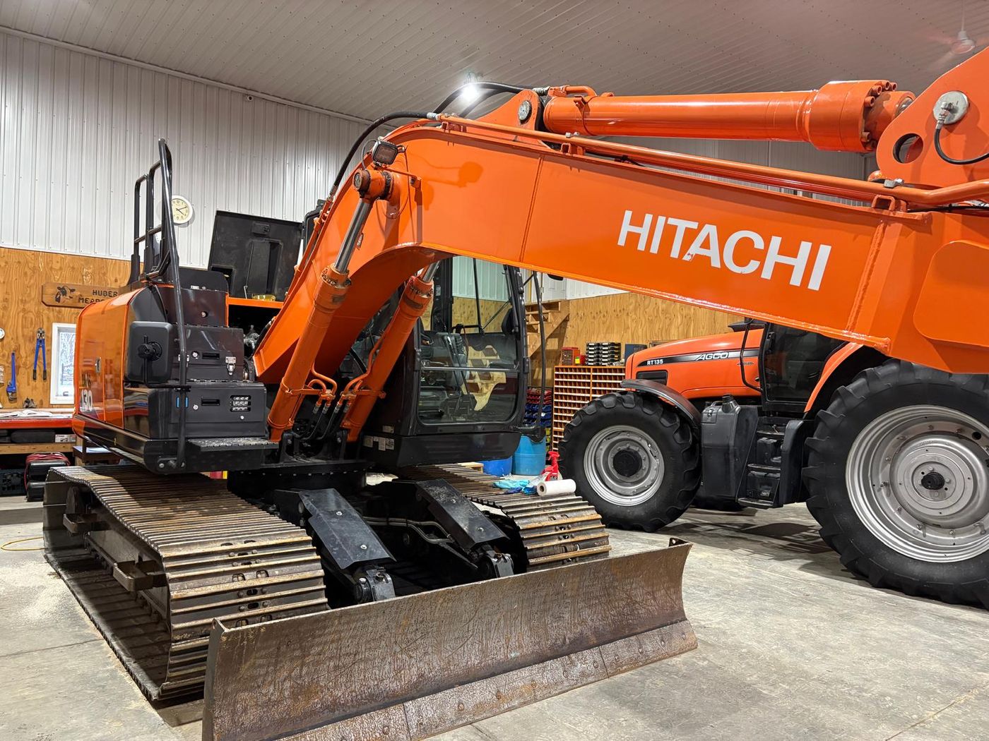 Hitachi ZX130 excavator after ceramic coating, glossy orange